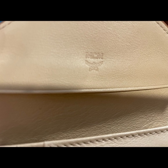 MCM trifold mini gold wallet.  Brand new without tags.